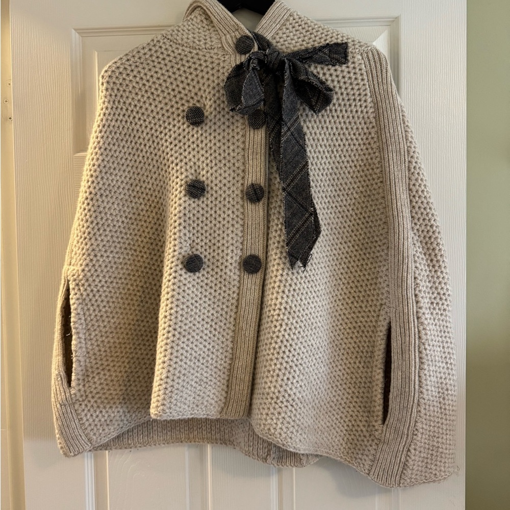 Tocca Cream Poncho with Black Bow - size large, stunning!